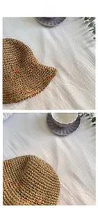 Detailed macro view of handmade colorful rainbow weaving pattern on the straw sun hat brim