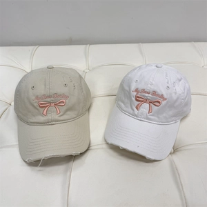 Distressed cotton baseball cap with My Love Darling embroidery and pink bow detail