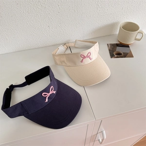Women sun visor hat with pink bow embroidery in navy blue and beige colors