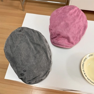 Retro washed cotton newsboy caps in charcoal grey and dusty pink with X embroidery