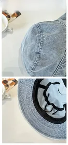 Detail of blue denim bucket hat showing inner sweatband and adjustable drawstring feature