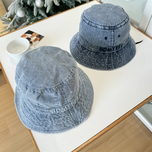 Denim bucket hats with letter embroidery in light and dark blue wash finishes