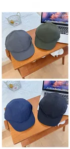 Detailed tile display of quick-dry short brim baseball caps in four vintage colors