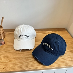 Distressed vintage cotton baseball caps with embroidered letters in white and navy blue colors