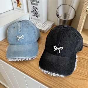 Denim baseball caps with pearl bows and lace brim details in light blue and black