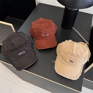 Distressed cotton baseball cap with raw edges and pin embroidery in three vintage colors