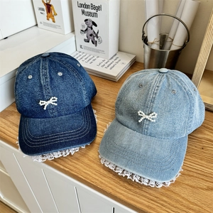 Denim baseball cap with pearl bow and lace trim, stylish headwear for women