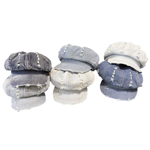 Japanese retro distressed denim newsboy caps in multiple washes with ripped details