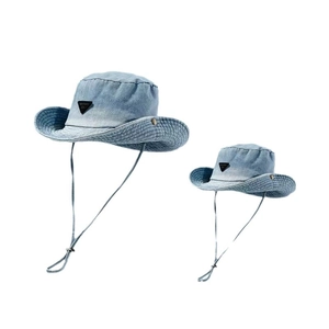 Washed denim sun hat with chin strap and triangle logo, light blue outdoor fisherman cap