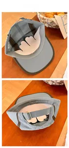 Detail view of quick-dry baseball cap featuring metal buckle and inner support structure