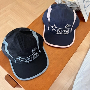 Quick-dry 5-panel baseball caps in black and navy contrast colors on wooden surface