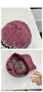Detail of vintage washed baseball cap with 3D embroidery and adjustable metal buckle