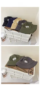 Detail view of quick-dry outdoor bucket hats with adjustable chin straps in five colors