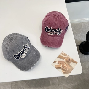Vintage washed denim baseball caps in dark grey and burgundy with Orlando embroidery