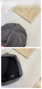 Detailansicht des Innenfutters und der Sternennähte der grauen Strickmütze