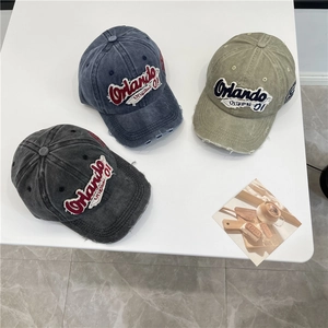 Retro washed denim baseball caps with Orlando embroidery and distressed brim details