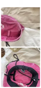 Détail du chapeau de randonnée rose avec broderie FRY et cordon coupe-vent réglable