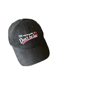 Vintage style black cotton canvas baseball cap with colorful embroidery on white background