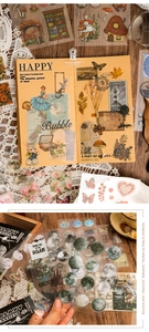 Close-up of vintage scrapbook stickers featuring butterflies and floral PET material