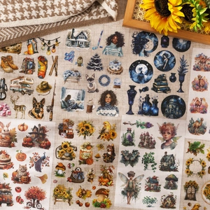 Vintage scrapbooking sticker set with autumn, winter and celestial themes on linen fabric