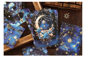 Vintage celestial scrapbook paper set featuring blue moon and star decorative designs