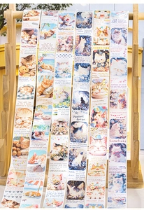 Hanging rolls of cute kitten theme washi tape for journaling and DIY scrapbooking