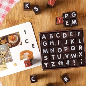 Vintage wooden alphabet stamp set with 26 letters and symbols for DIY scrapbooking