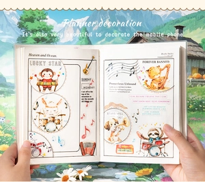 Detail of cute animal concert PET stickers featuring cartoon pet musicians on diary page