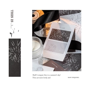 Detailed view of vintage fireworks embossed memo cards with matte finish and silver foil