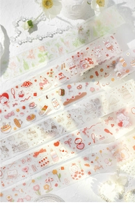 Detail of PET tape featuring cute bears, sweets, and floral hand-drawn patterns for journaling