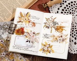 Macro detail of vintage floral PET stickers with gold foil accents and poetic quotes