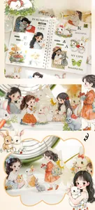 Close-up of girl and rabbit themed hand-drawn stickers applied on a spiral notebook