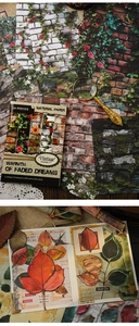 Detail of vintage scrapbooking paper with brick and rose patterns and magnifying glass
