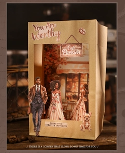 Close-up of vintage coffee-themed stickers and 3D collage on kraft paper gift bag