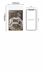 Detailed size comparison of vintage steampunk gear stickers with an iPhone X reference