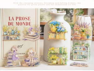 Detailed view of vintage PET stickers with floral and book illustrations on a vase