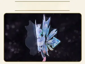 Macro shot of laser holographic PET crystal stickers with die-cut shapes for DIY journals