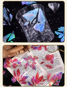 Detailed view of iridescent laser PET stickers on vintage glassware and books