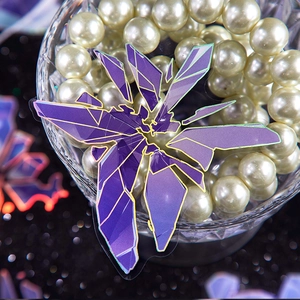 DIY purple geometric crystal PET stickers displayed in a glass filled with white pearls