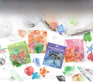 Detail of four themed PET stickers with botanical designs for scrapbooking and DIY crafts