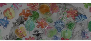 Detailed view of floral and fruit PET stickers on a vintage tray for DIY scrapbooking