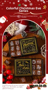 Macro detail of Christmas theme wooden stamp set with gold foil and festive patterns