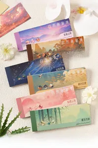 Macro view of six artistic nature-themed landscape sticker books with floral decor
