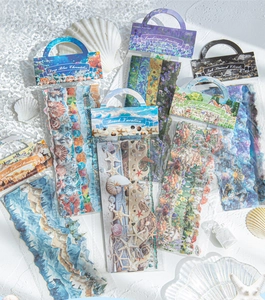 Detail of vintage nature-themed scrapbooking stickers with ocean and forest art patterns