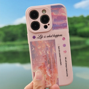 Pink silicone iPhone case featuring artistic sunset oil painting collage and typography