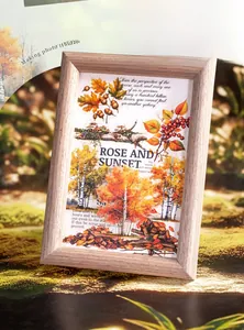 Detail of light wood frame featuring autumn theme stickers with leaves and acorns