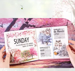 Detail of DIY scrapbook paper featuring vintage cherry blossom and seasonal tree illustrations