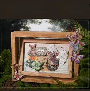 3D vintage cardstock sticker detail with deer and floral motifs in a forest frame