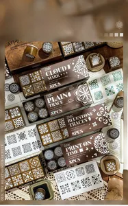 Close-up of vintage wood stamps with floral patterns on a retro paper background