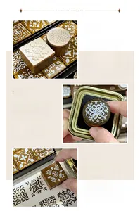 Macro detail of beech wood and rubber stamps showing vintage mandala and floral textures